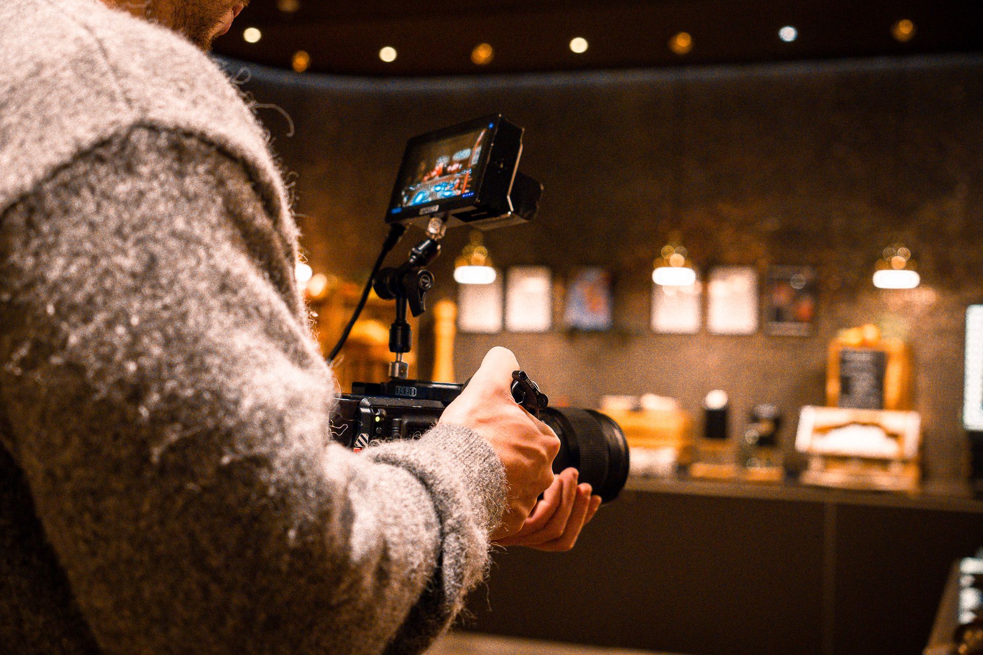 Team holding a camera