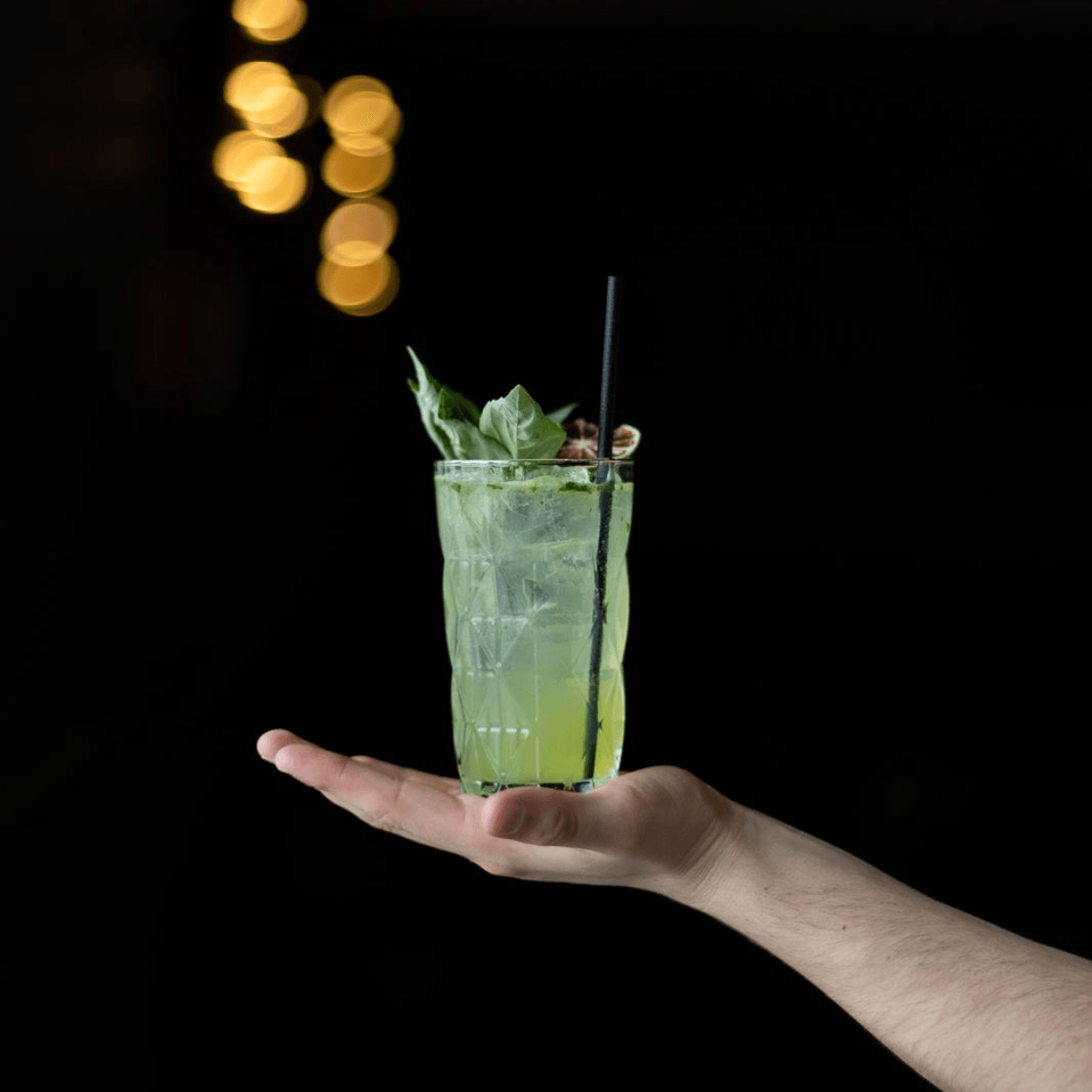 cocktail in hand